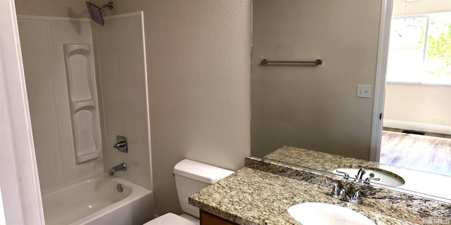 full bathroom featuring shower / bath combination, toilet, and vanity