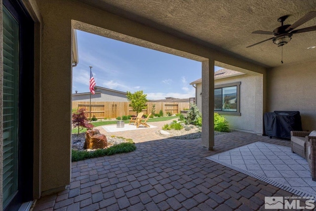 view of patio / terrace with ceiling fan