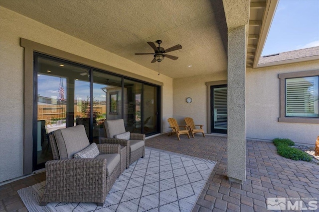 view of patio with ceiling fan