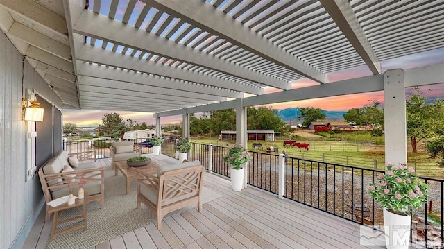 deck at dusk with a pergola