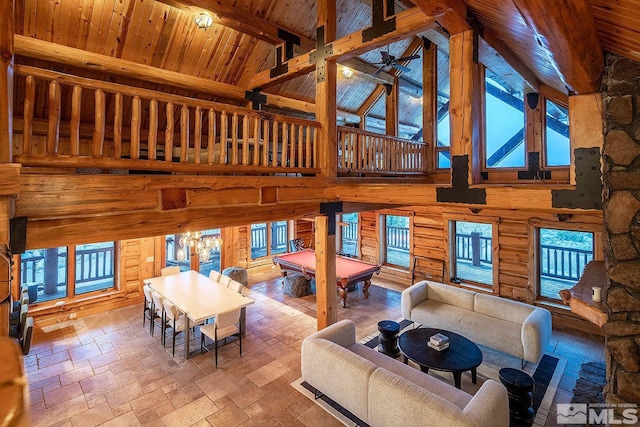 living room featuring high vaulted ceiling, billiards, beamed ceiling, log walls, and wood ceiling