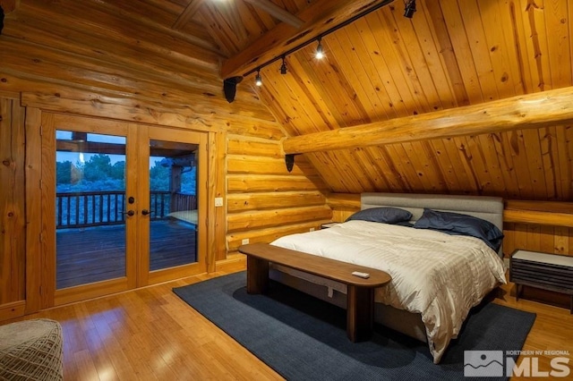 bedroom featuring hardwood / wood-style flooring, wood ceiling, access to outside, and vaulted ceiling with beams