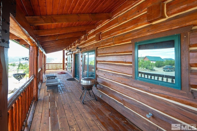 wooden deck featuring a porch