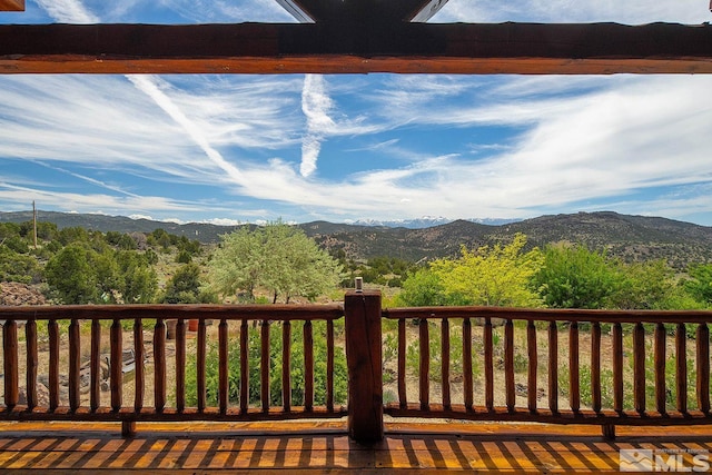 deck with a mountain view