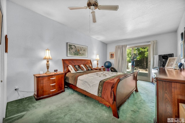 carpeted bedroom featuring ceiling fan, access to exterior, and a textured ceiling