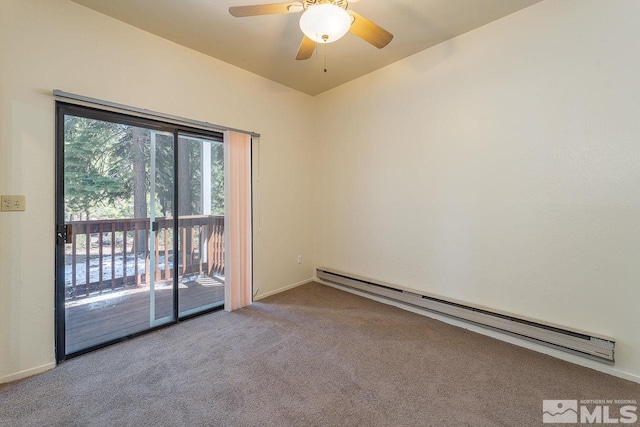 spare room with ceiling fan, light colored carpet, and a baseboard heating unit