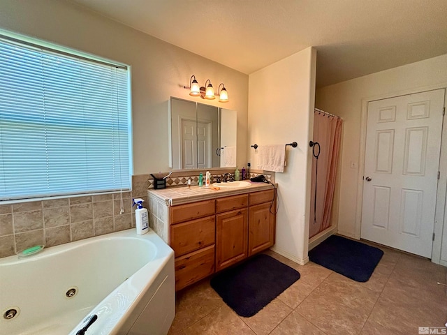 bathroom with a bath, tile flooring, and vanity with extensive cabinet space