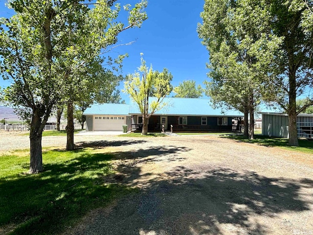 view of yard with a garage