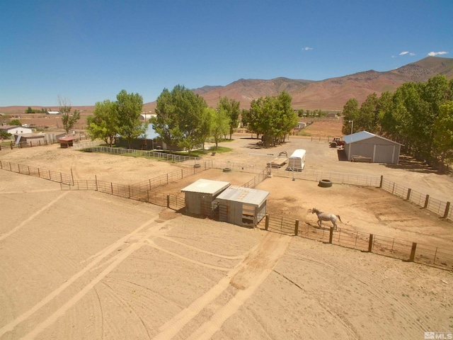 exterior space with a mountain view and a rural view