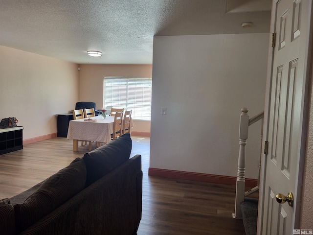 office space featuring hardwood / wood-style floors and a textured ceiling