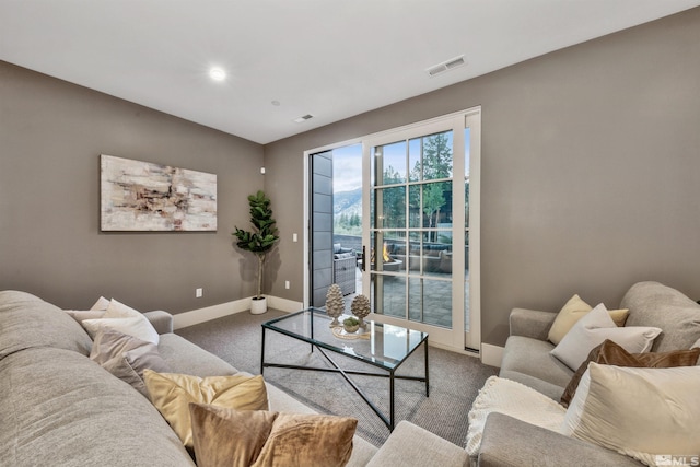 living room featuring carpet