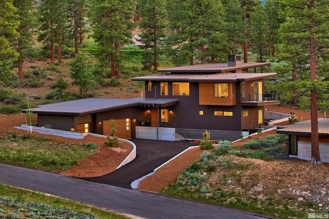 prairie-style house featuring a balcony