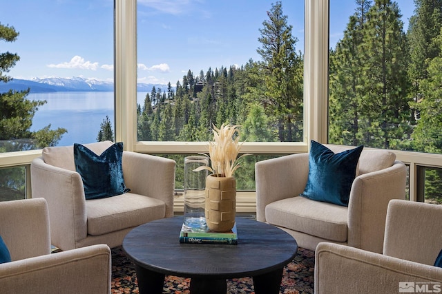 sunroom / solarium with a mountain view