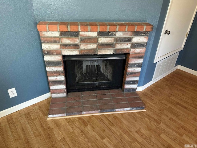 interior details featuring hardwood / wood-style flooring