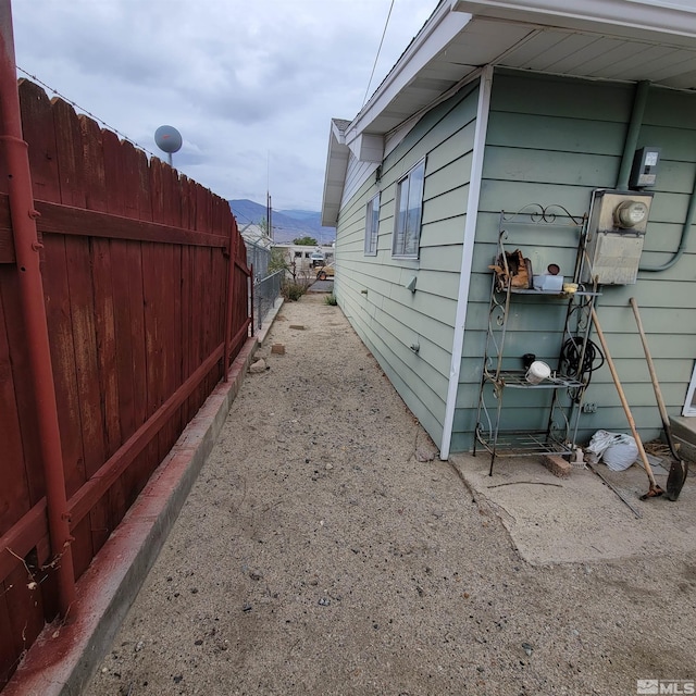 view of side of property featuring a mountain view