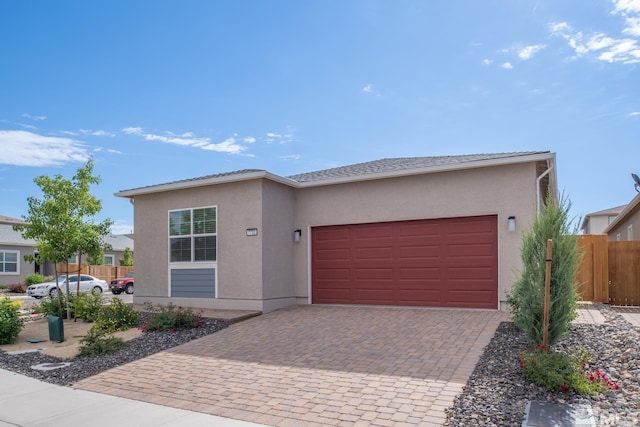 view of front of home with a garage