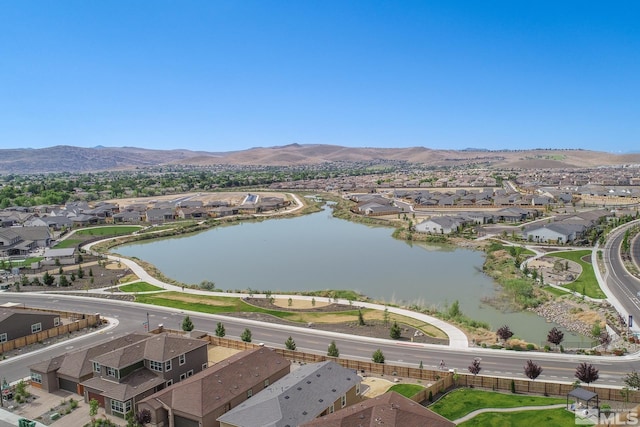 bird's eye view featuring a water and mountain view