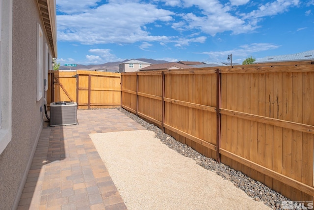 view of patio with cooling unit