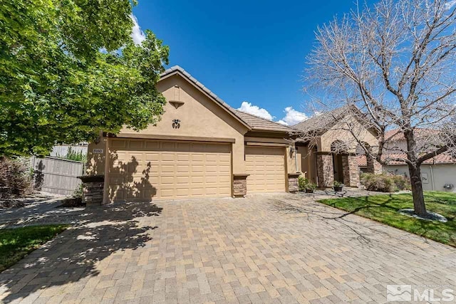 view of front of home featuring a garage