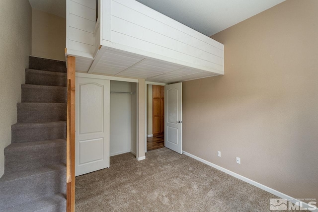 basement with light colored carpet