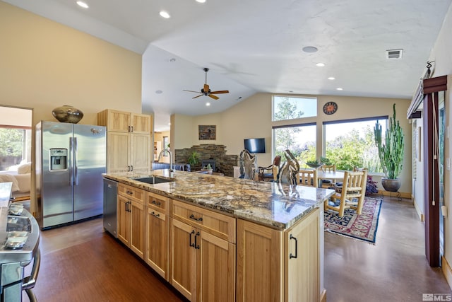 home office with a mountain view, a healthy amount of sunlight, light carpet, and ceiling fan