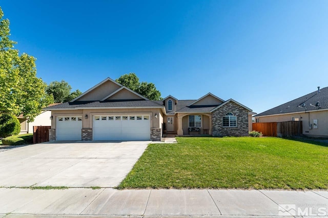 ranch-style home with a garage and a front yard