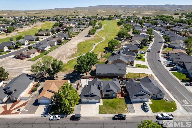 bird's eye view with a mountain view