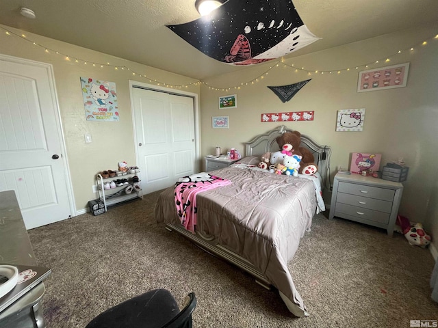 carpeted bedroom featuring a closet