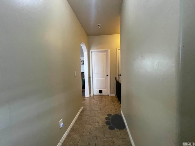 corridor featuring tile flooring