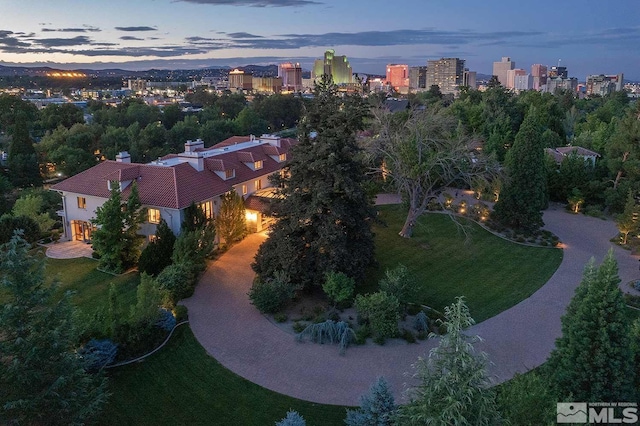 aerial view at dusk with a city view