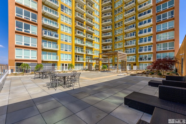 view of community with a patio