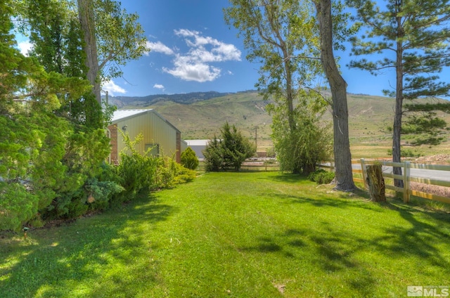 view of yard with a mountain view