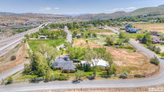 birds eye view of property featuring a mountain view