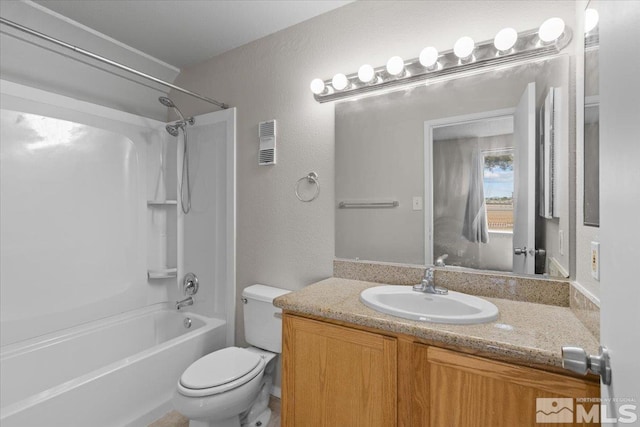 full bathroom featuring vanity, shower / bathing tub combination, and toilet