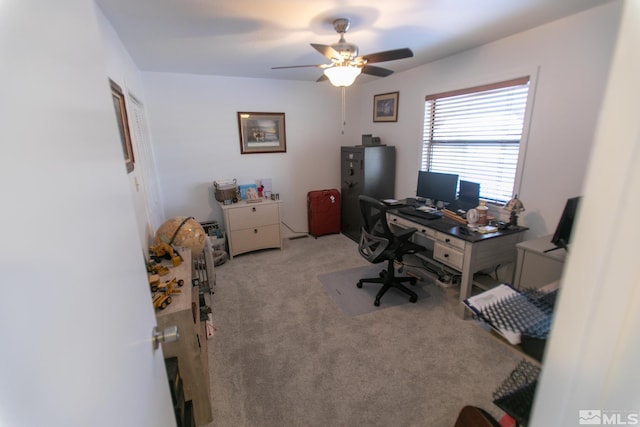 office area featuring light colored carpet and ceiling fan