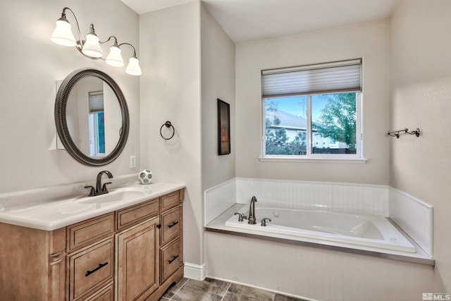 bathroom with a bathtub and vanity