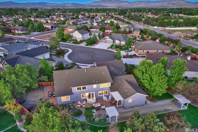 drone / aerial view featuring a mountain view