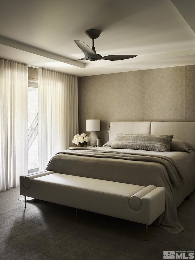 bedroom featuring carpet and ceiling fan