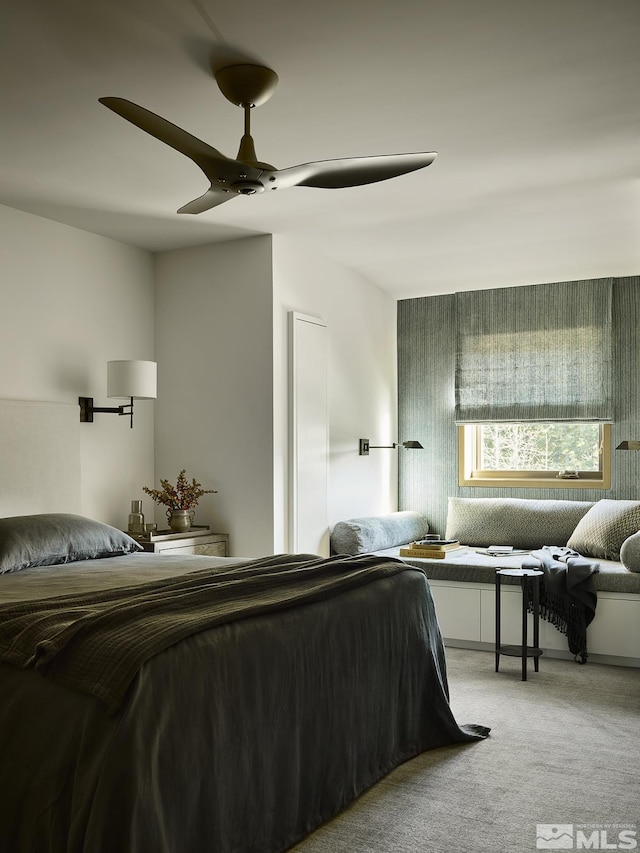 carpeted bedroom featuring ceiling fan