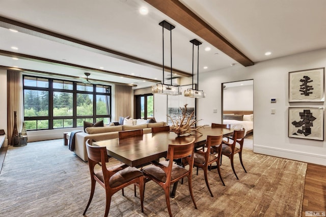 dining room with beamed ceiling