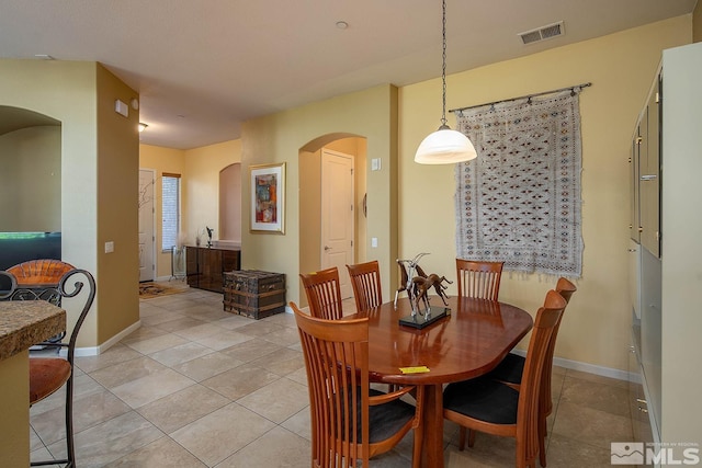 view of tiled dining space