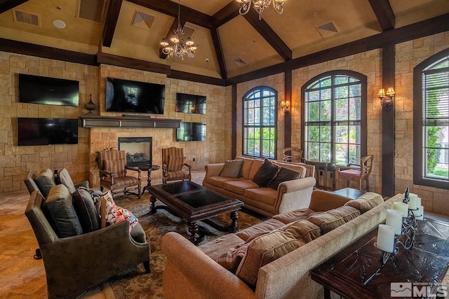 living room with beam ceiling, high vaulted ceiling, and a chandelier