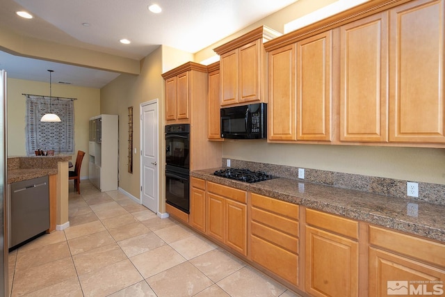 kitchen featuring black appliances, decorative light fixtures, light brown cabinets, and light tile patterned floors