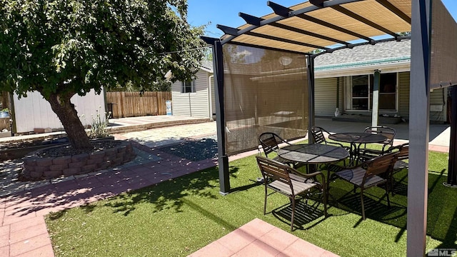 view of yard with a patio area and a pergola