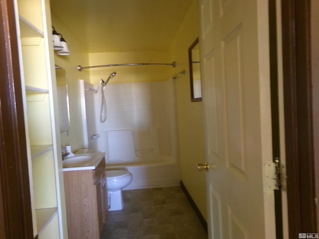 full bathroom with tub / shower combination, tile flooring, toilet, and vanity