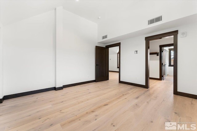 unfurnished room with light hardwood / wood-style flooring