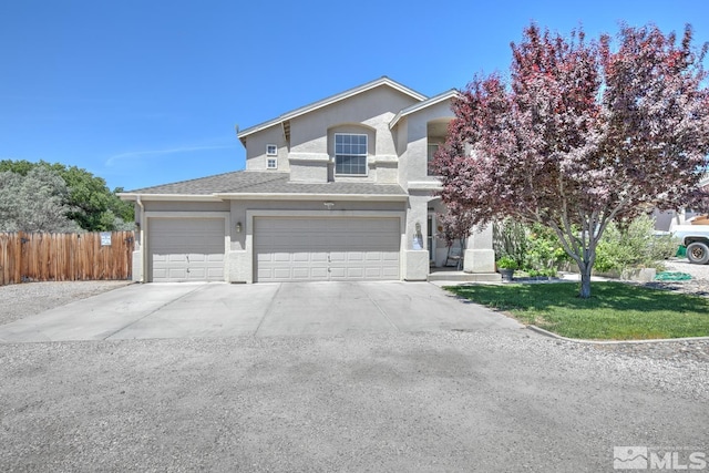 front of property featuring a garage