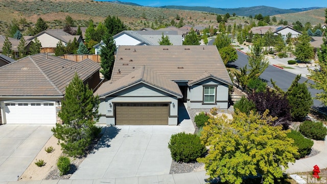 drone / aerial view featuring a mountain view