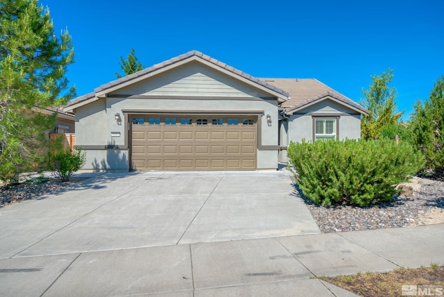 ranch-style house with a garage