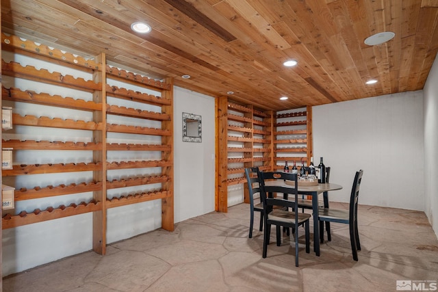 unfurnished dining area featuring wooden ceiling